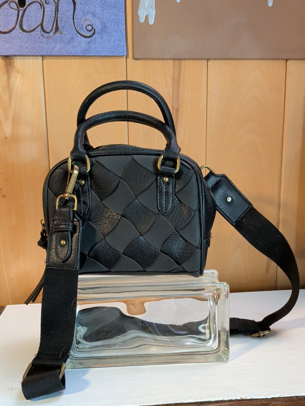 Small black wavy woven faux leather handbag
